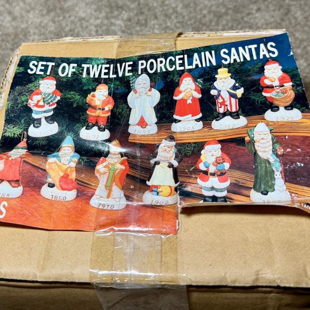 Set of Twelve Porcelain Santa Figurines